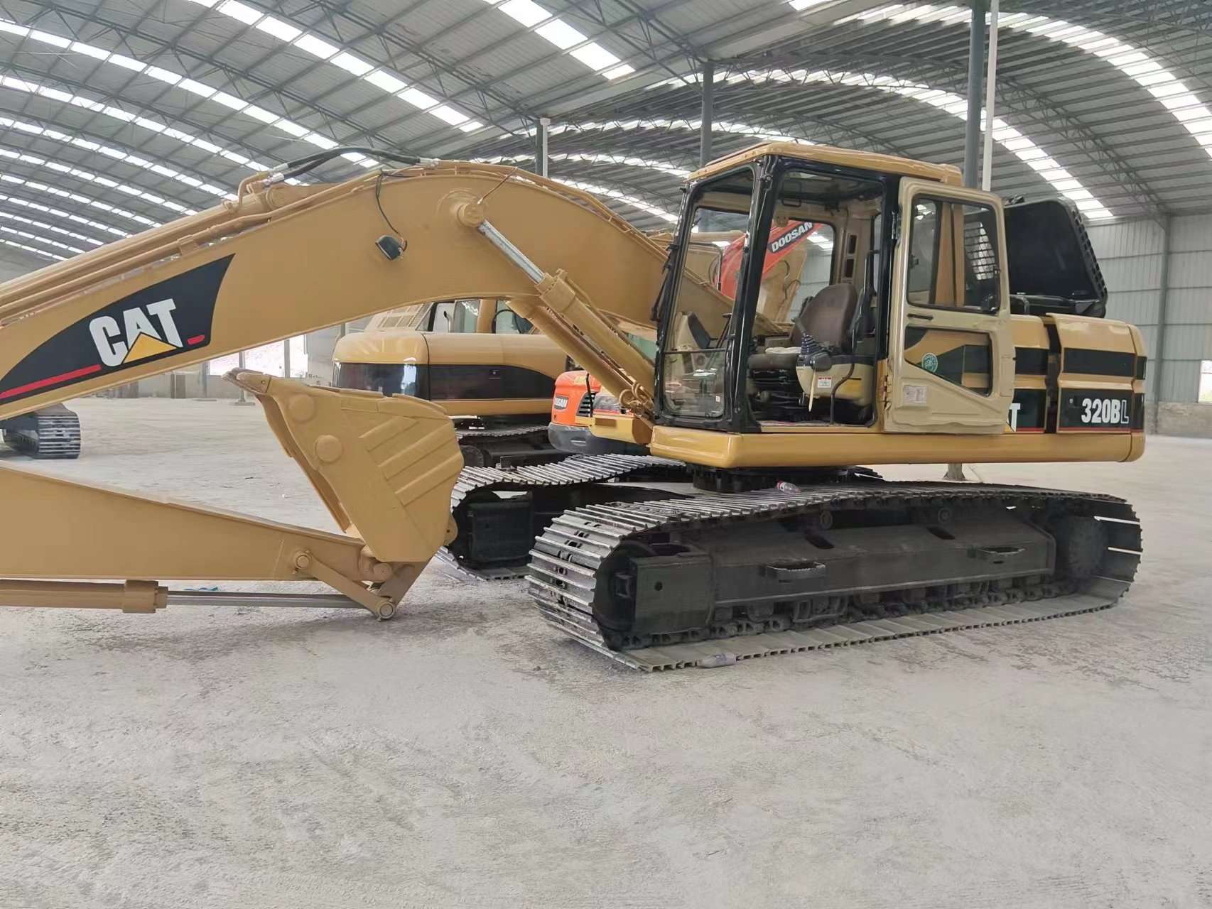 Caterpillar 320BL Excavator.